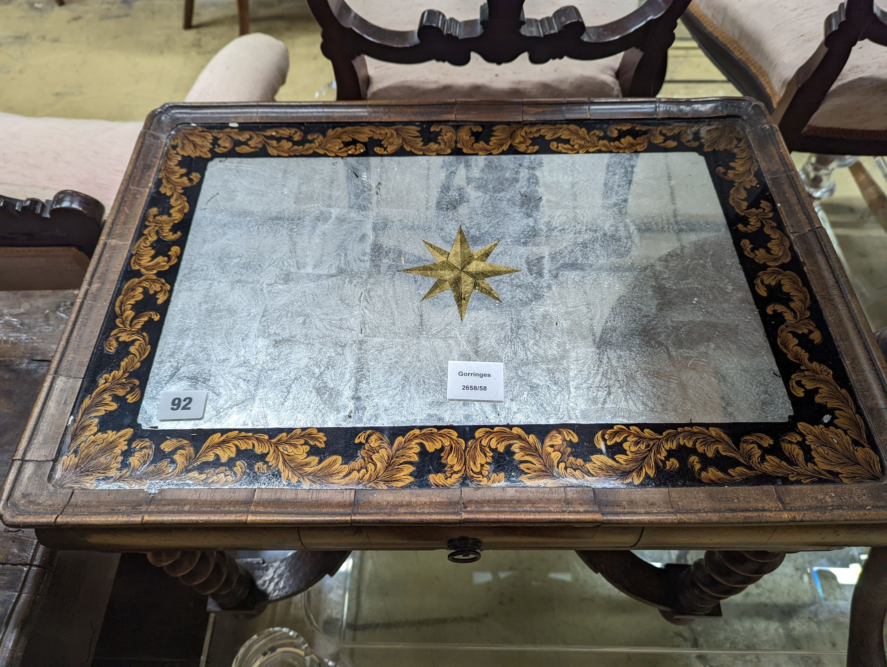 A walnut side table with mirrored top, (altered) width 59cm, depth 42cm, height 43cm